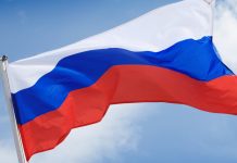 На матче ПАОК — «Динамо» Киев в Люблине вывесили флаг России На матче ПАОК — «Динамо» Киев в Люблине вывесили флаг России