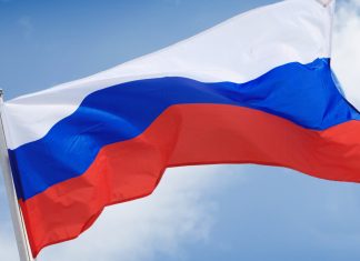 На матче ПАОК — «Динамо» Киев в Люблине вывесили флаг России На матче ПАОК — «Динамо» Киев в Люблине вывесили флаг России